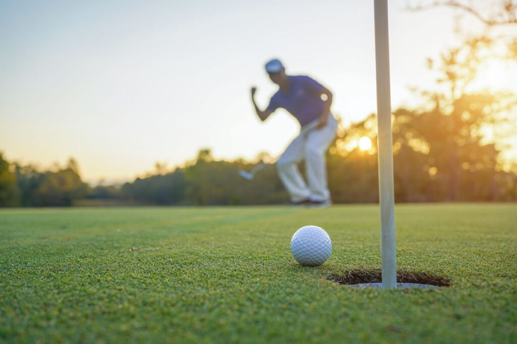 Golf ball near a hole