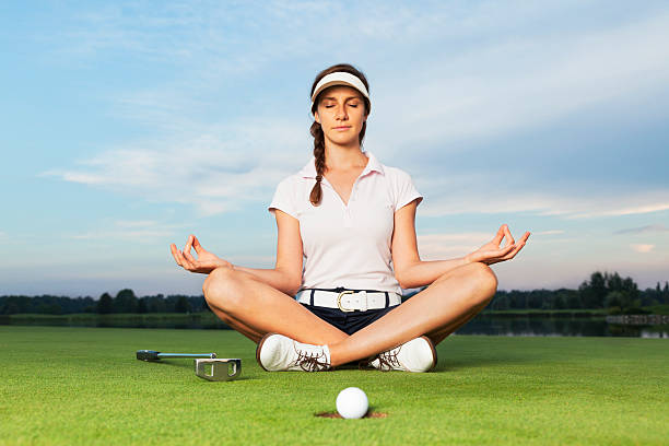 Yoga posture on golf course for mental golf skills
